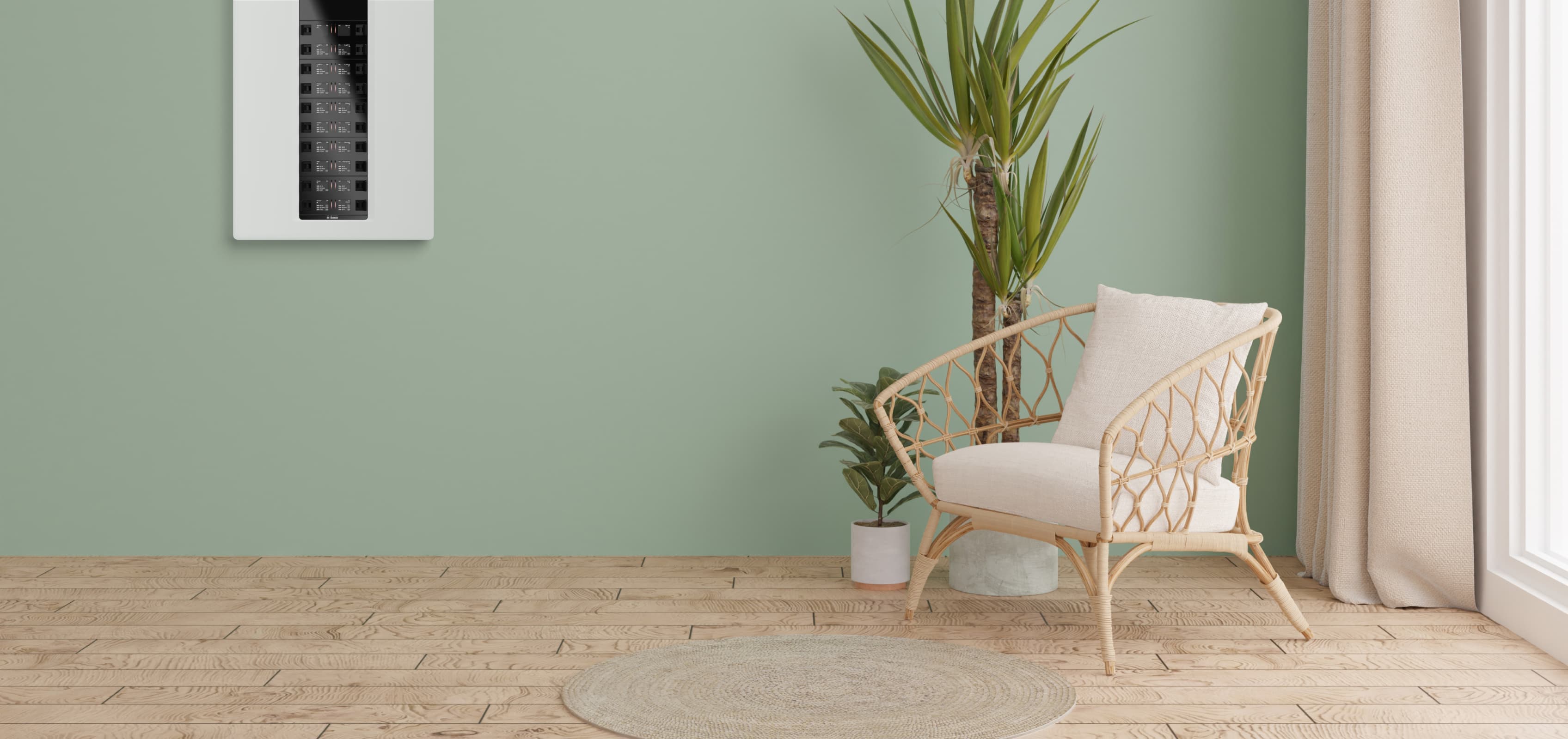 A Basis Board mounted on a sage-green wall above a rattan armchair and indoor plants