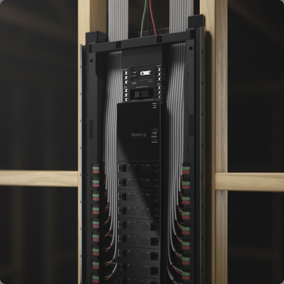 Zoomed-in view of the uncovered Basis Board cutaway showing the surge protection device module above the main switch, with cable conduits running vertically either side.
